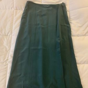 Emerald green midi length skirt with slit